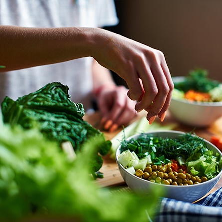 Patient preparing healthy meal in kitchen at home